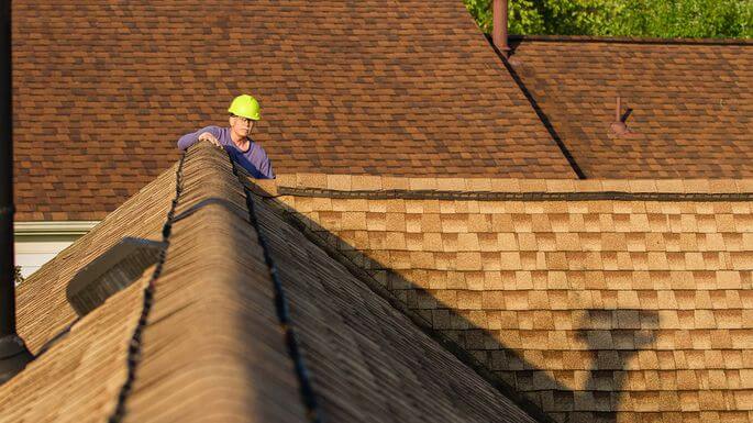 home inspector on a roof