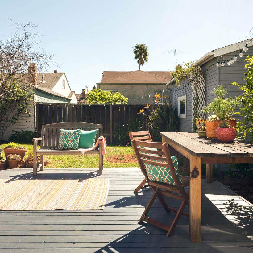 Outdoor setting with flowers and chairs