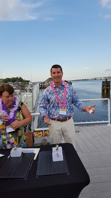 CEO and staff member on the deck