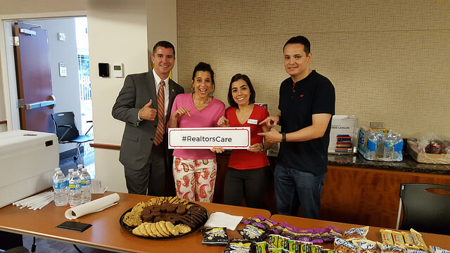 CEO and staff preparing for food drive