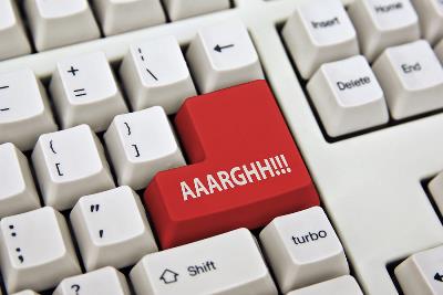 A keyboard with AAARGHH!!! in red