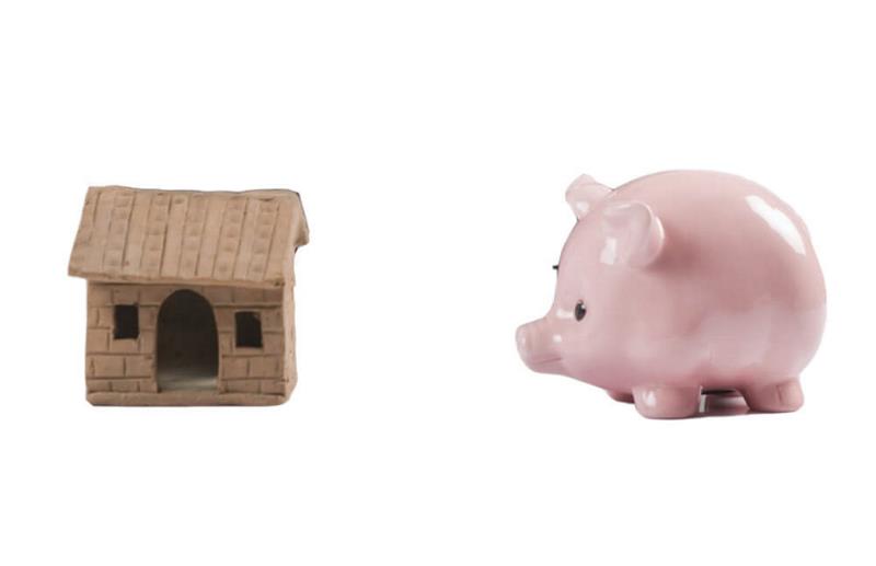 Piggy bank and an image of a house