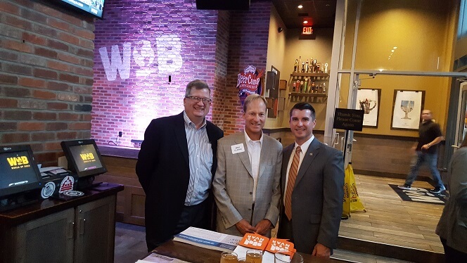 Ryan with 2 others at rpac business and beer event
