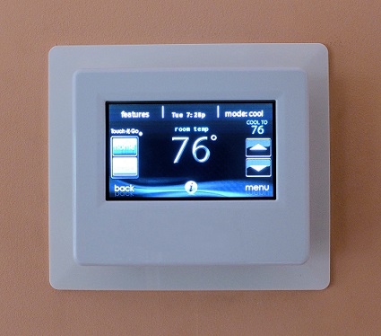 A thermostats on the wall