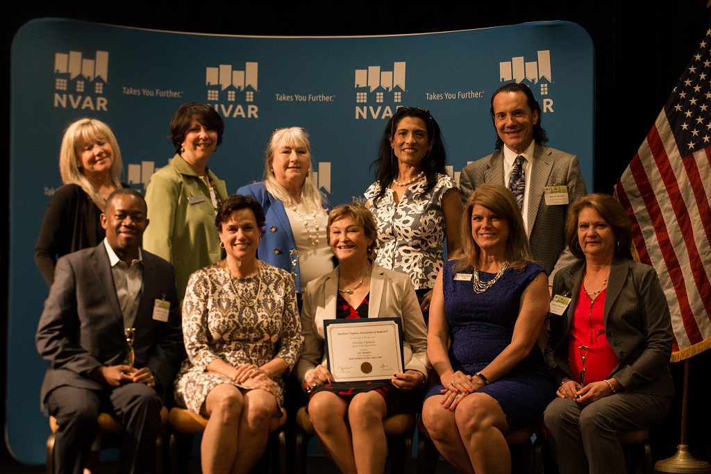 Life Members gather for photo onstage