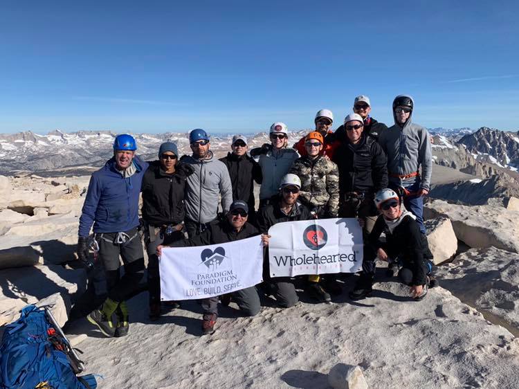 The team with our guides at the summit