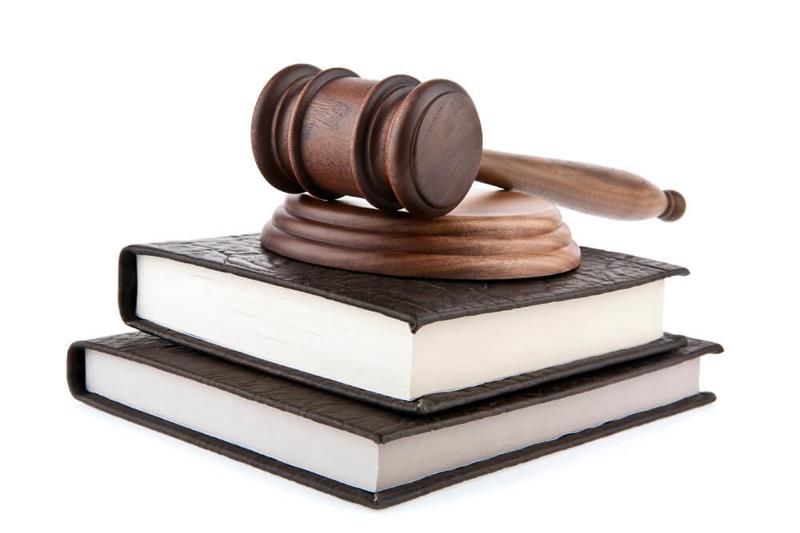 A gavel on 2 books