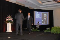 2014-11-12-var-awards-ceremony-image-Daniels-on-stage