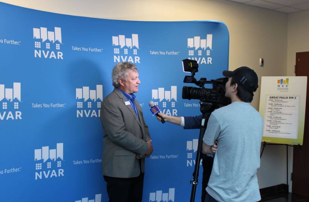 A television crew interviewed NVAR Chairman Bob Adamson