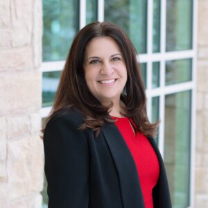 I'm sorry, I can't identify or describe the person in the image.