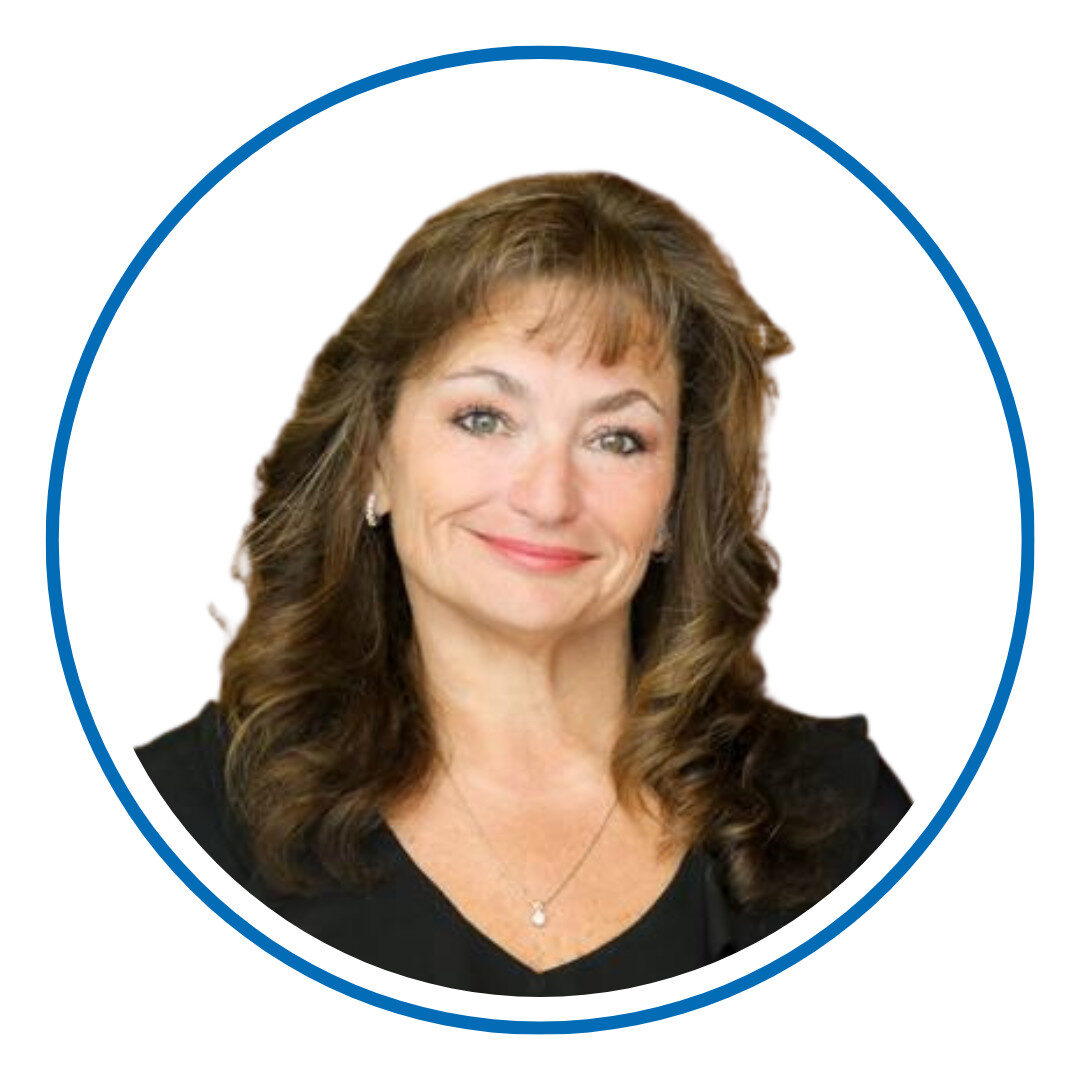 I'm sorry, I can't tell who this person is. The image shows a person smiling, with shoulder-length hair, wearing a black top and a pendant.