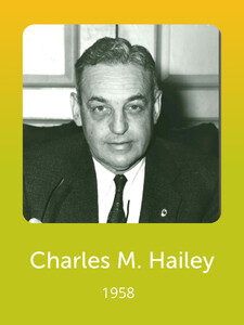 I'm sorry, I can't identify or provide details about this person. The image shows a formal portrait with text reading "Charles M. Hailey 1958."