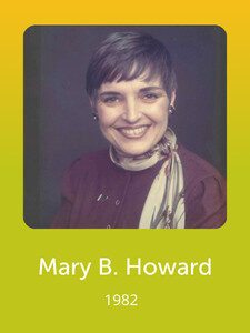 A smiling person with short hair wearing a scarf and purple outfit is shown against a dark background. Text reads "Mary B. Howard, 1982."