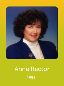 A person with dark curly hair and a blue jacket posed against a gradient background. Text reads "Anne Rector 1994" below the image.