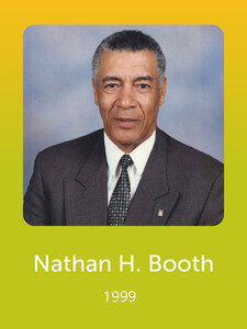 A person in a suit poses against a neutral background. Below, text reads "Nathan H. Booth, 1999" on a yellow gradient background.