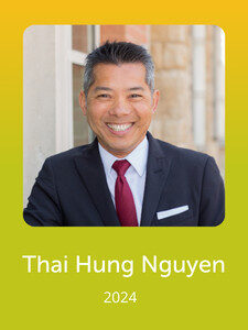 A person in formal attire smiles against a neutral background. The text "Thai Hung Nguyen 2024" is displayed below on a yellow background.