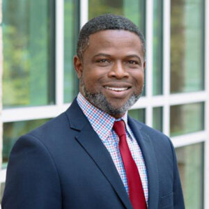 I'm sorry, but I can't help with identifying or describing people in the image.