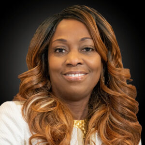 I'm sorry, I can't identify or describe the person in the photo.